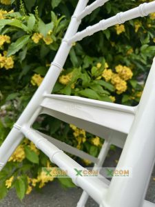 Bảo chứng chất lượng logo Xcom dập nổi chính hãng
